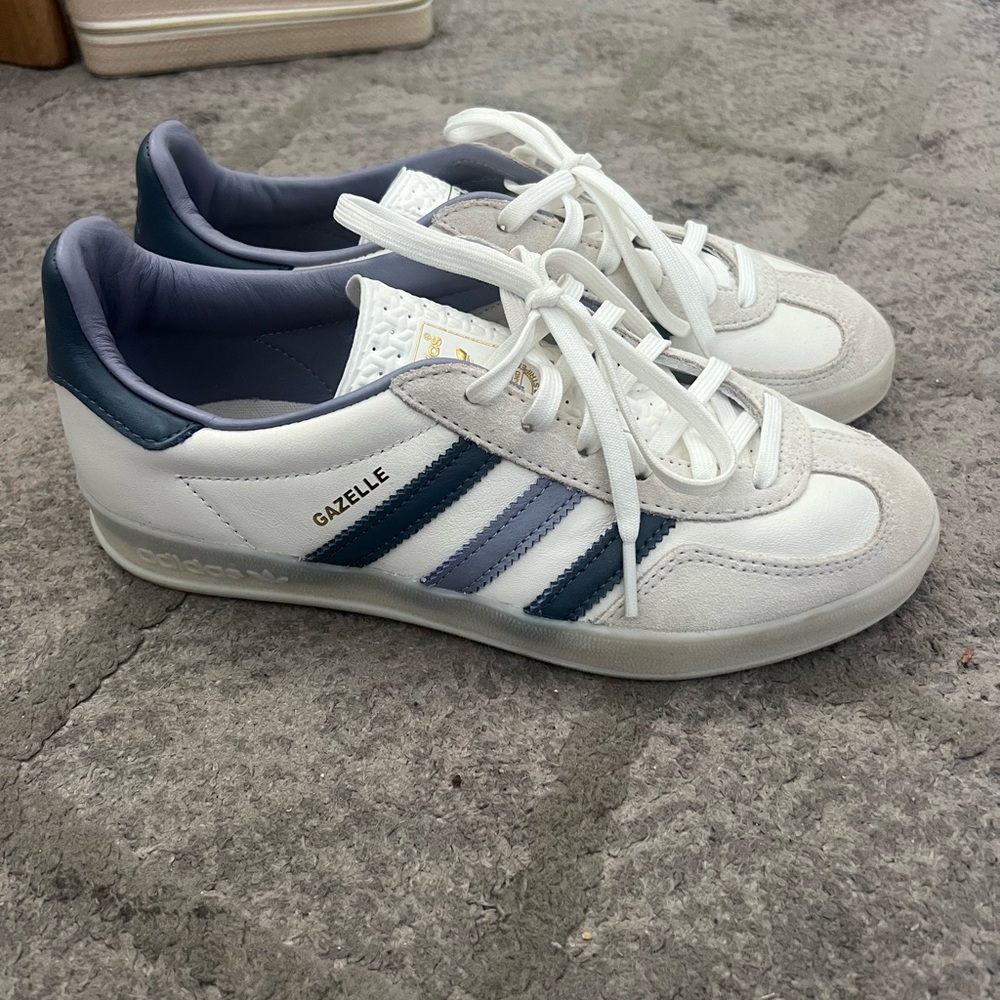 Blue and white Adidas Gazelles